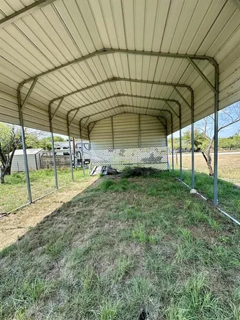 a view of a backyard of a house