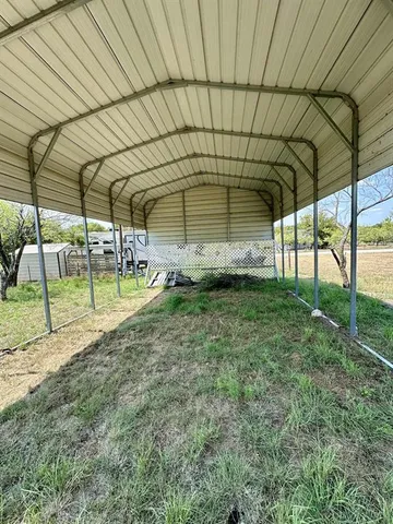 a view of a backyard of a house