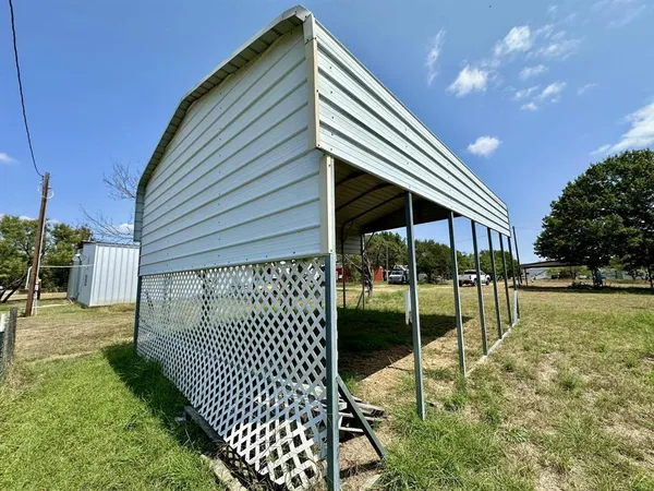 a balcony view with a garden