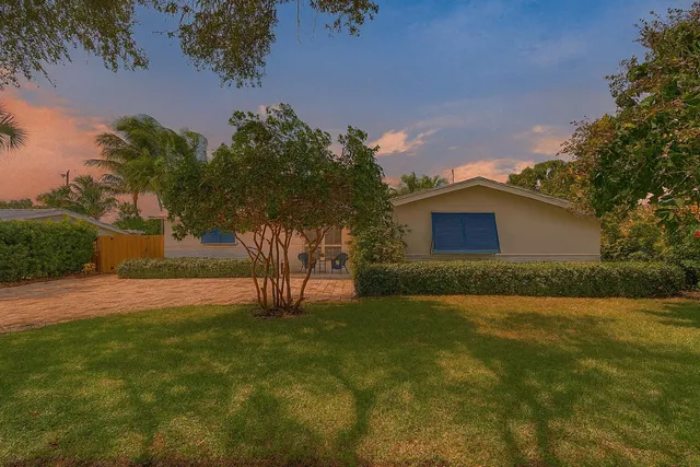 a view of a backyard with a garden