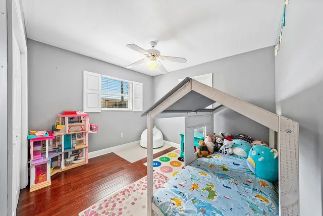 a view of a house with swimming pool and sitting area