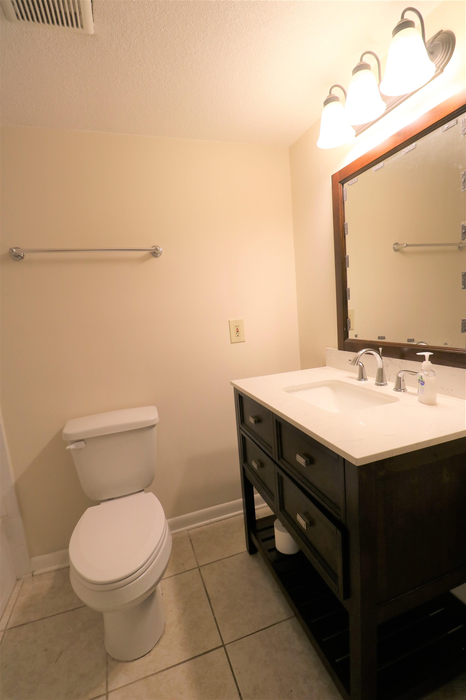 1255 Ponce Island Drive, Unit 739 St. Augustine, FL 32095 - Photo 5 of 10 a bathroom with a sink and a toilet
