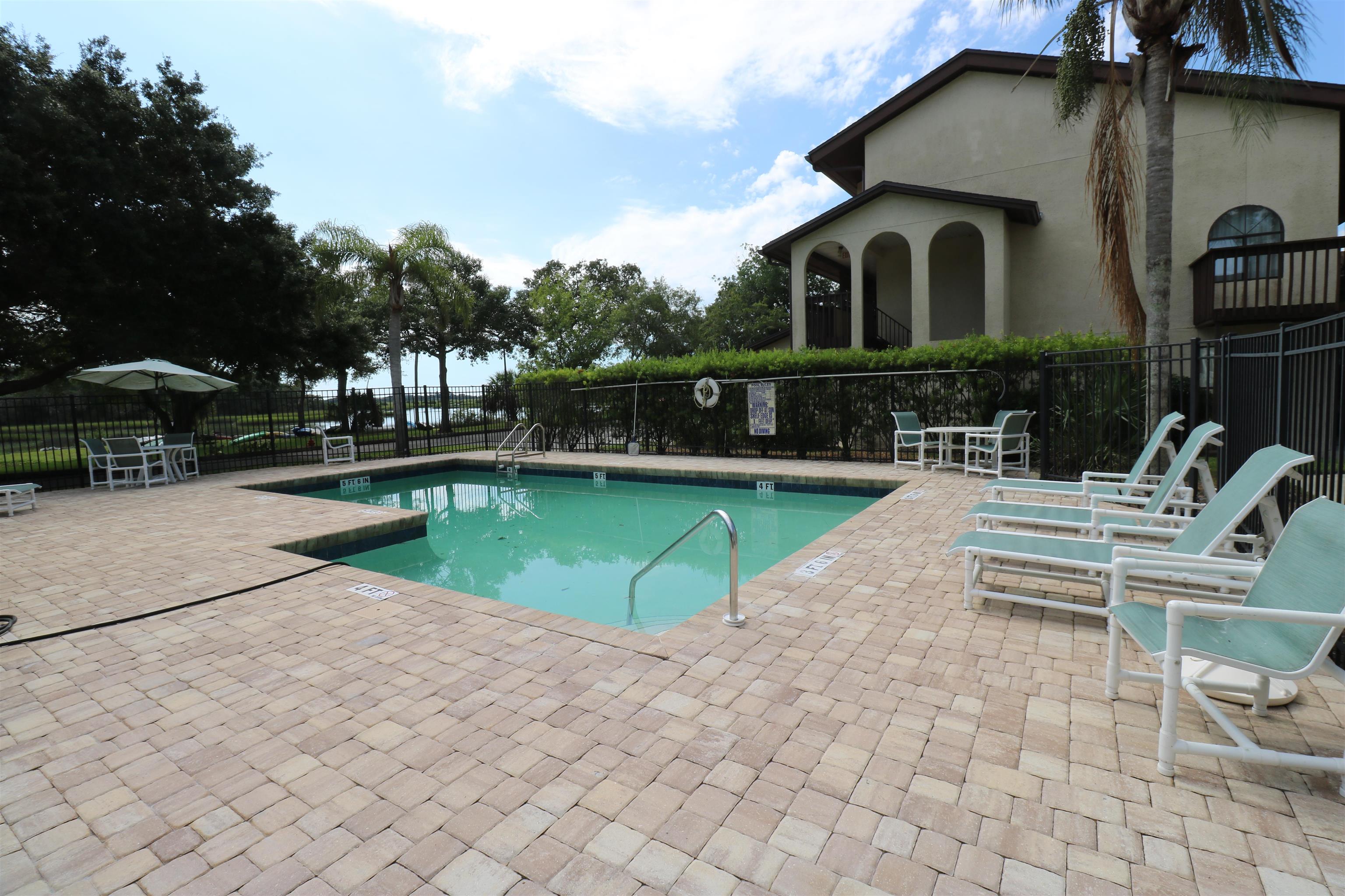 1255 Ponce Island Drive, Unit 739 St. Augustine, FL 32095 - Photo 7 of 10 a view of a house with a yard