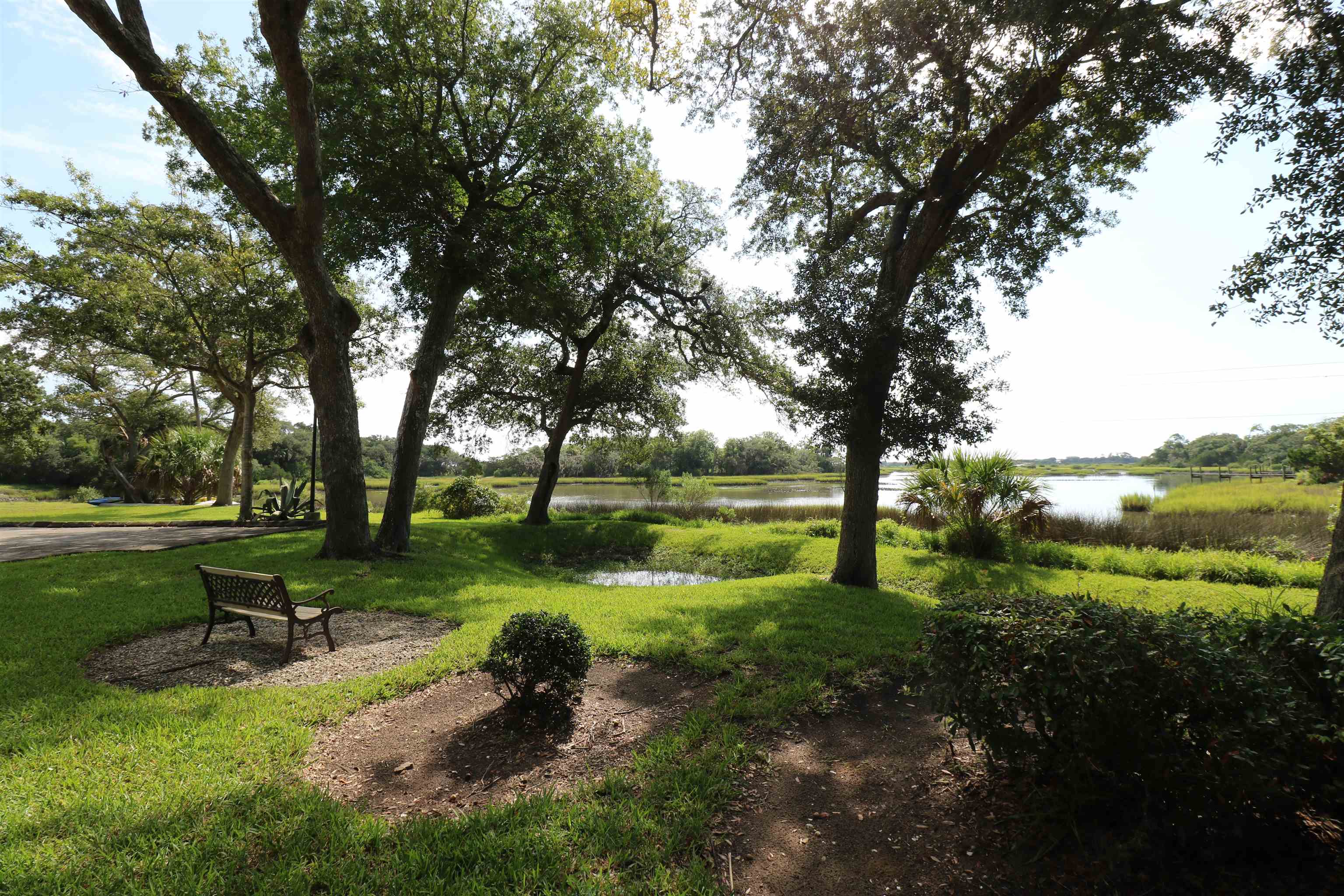 1255 Ponce Island Drive, Unit 739 St. Augustine, FL 32095 - Photo 8 of 10 a view of a park with large trees