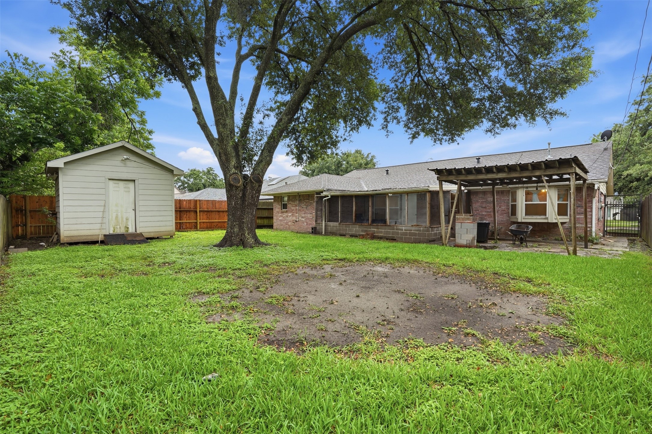 2605 Burke Road Pasadena, TX 77502 - Photo 28 of 29 a view of a house with yard and tree s