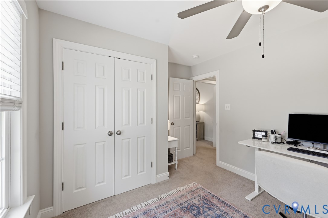 222 Oak Ridge Court Aylett, VA 23009 - Photo 23 of 35 Recessed-panel closet doors featuring round satin