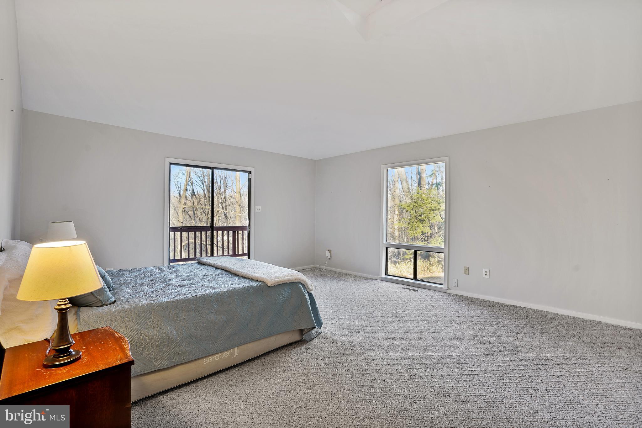 1052 Bellview Road McLean, VA 22102 - Photo 16 of 36 a bedroom with a bed and a window