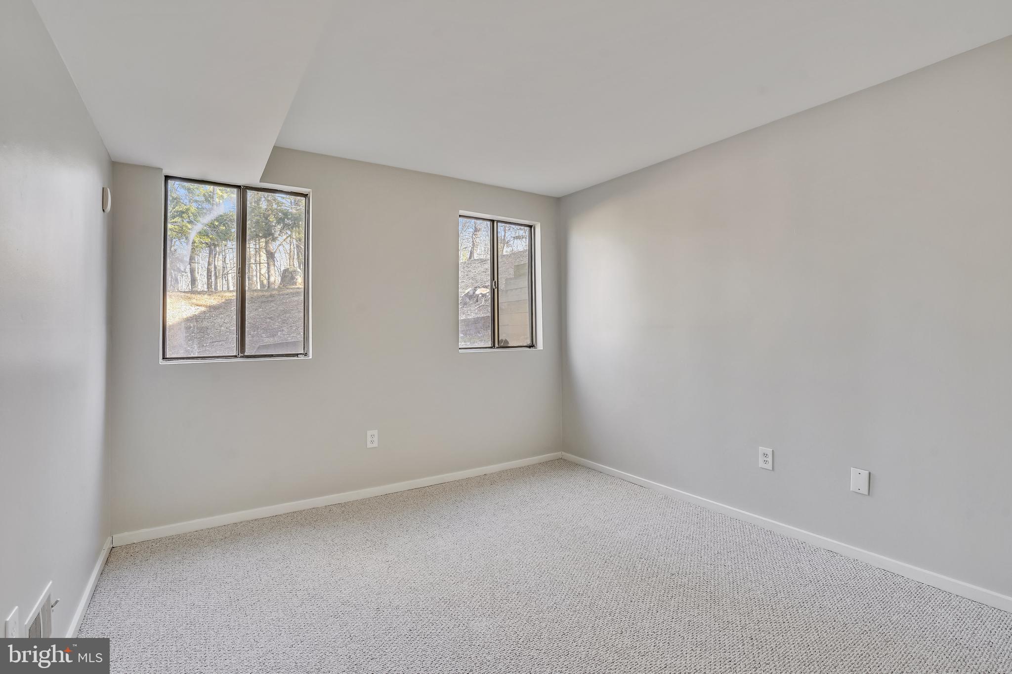 1052 Bellview Road McLean, VA 22102 - Photo 22 of 36 a view of an empty room with windows