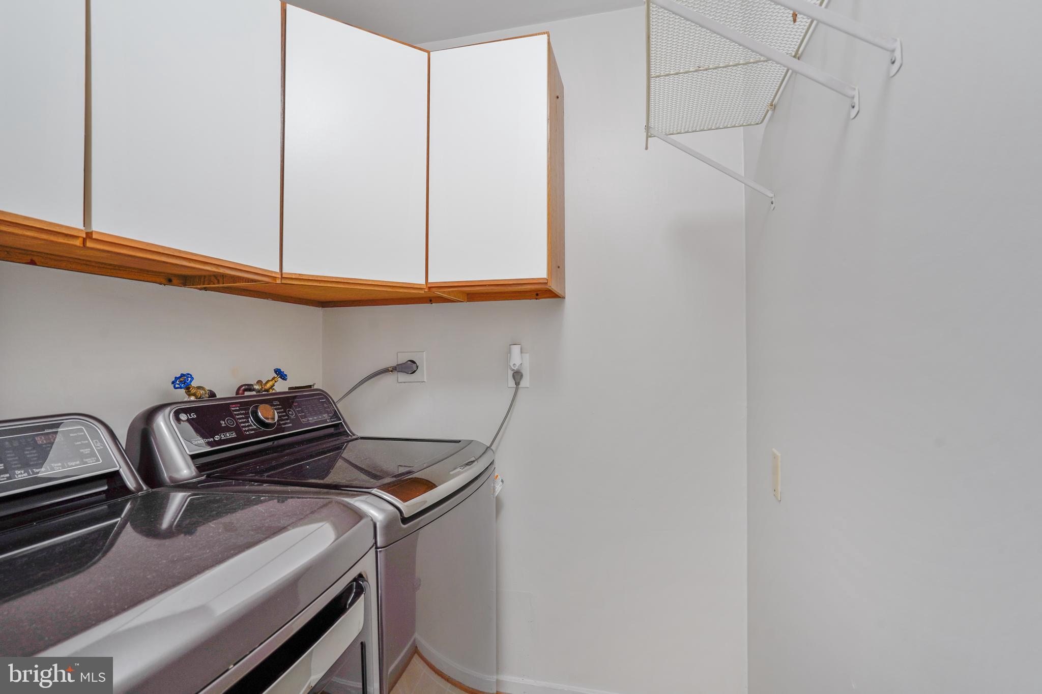 1052 Bellview Road McLean, VA 22102 - Photo 32 of 36 a close view of a sink and cabinets