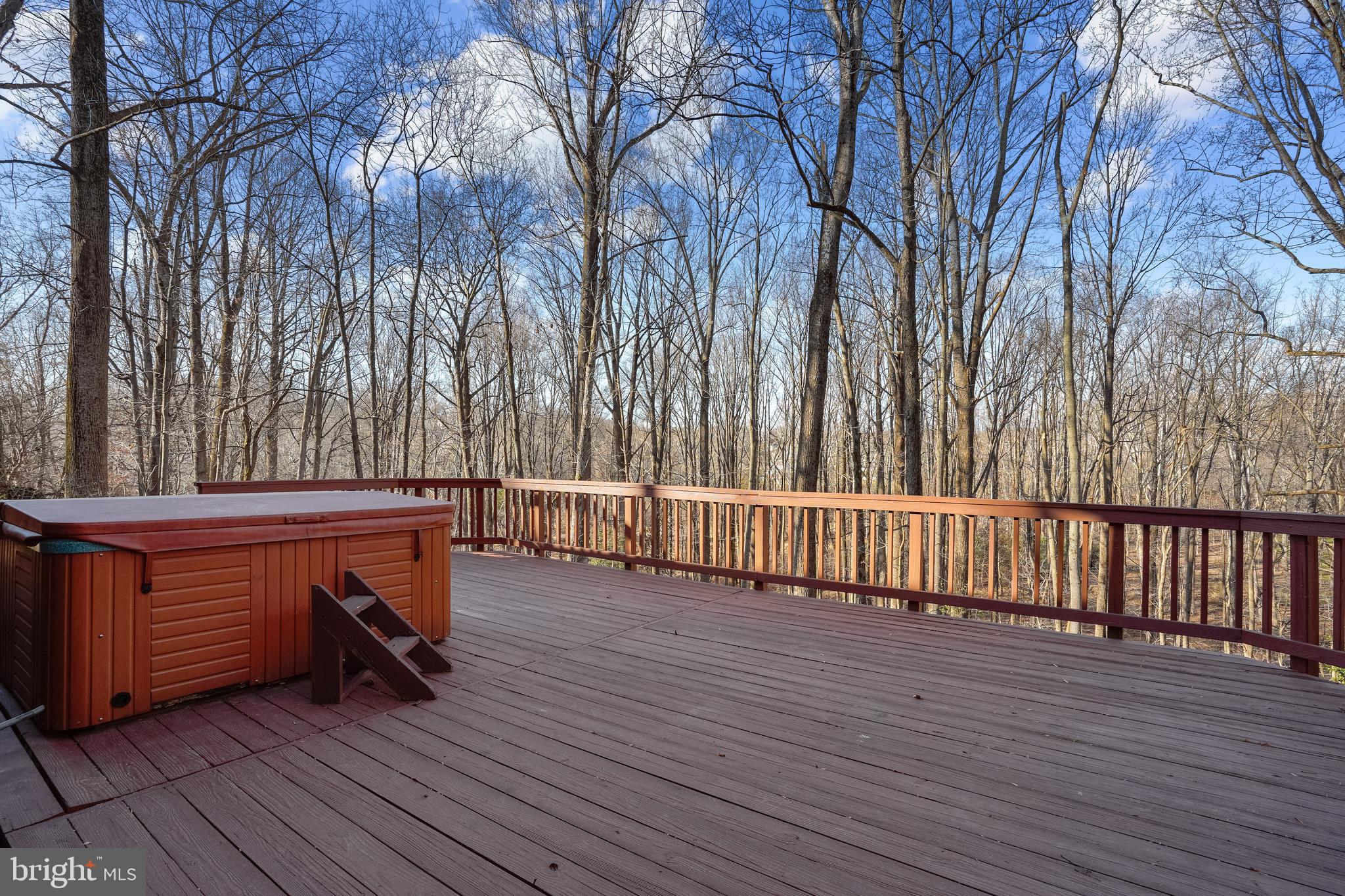 1052 Bellview Road McLean, VA 22102 - Photo 35 of 36 a backyard of a house with wooden floor table and chairs