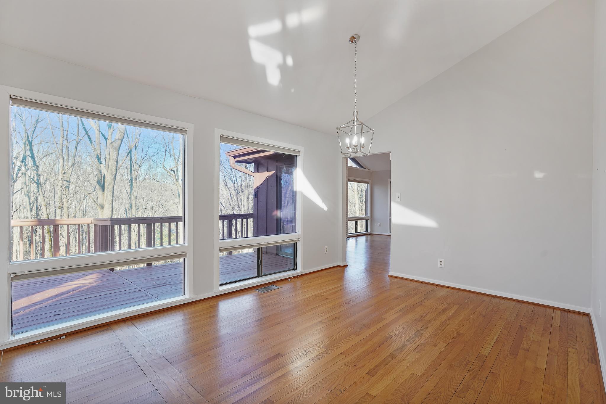 1052 Bellview Road McLean, VA 22102 - Photo 9 of 36 wooden floor in an empty room with a window