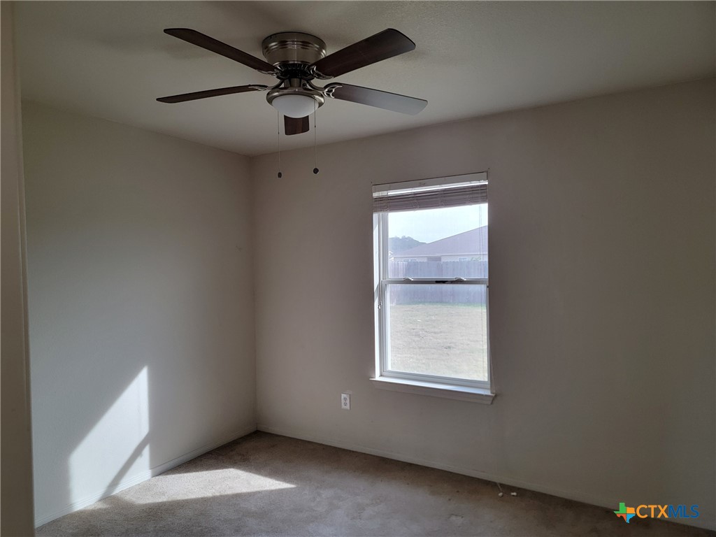 3505 Logsdon Street Copperas Cove, TX 76522 - Photo 8 of 17 an empty room with a window