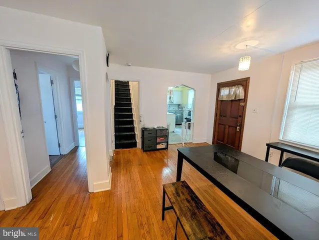 a view of a living room and dining room