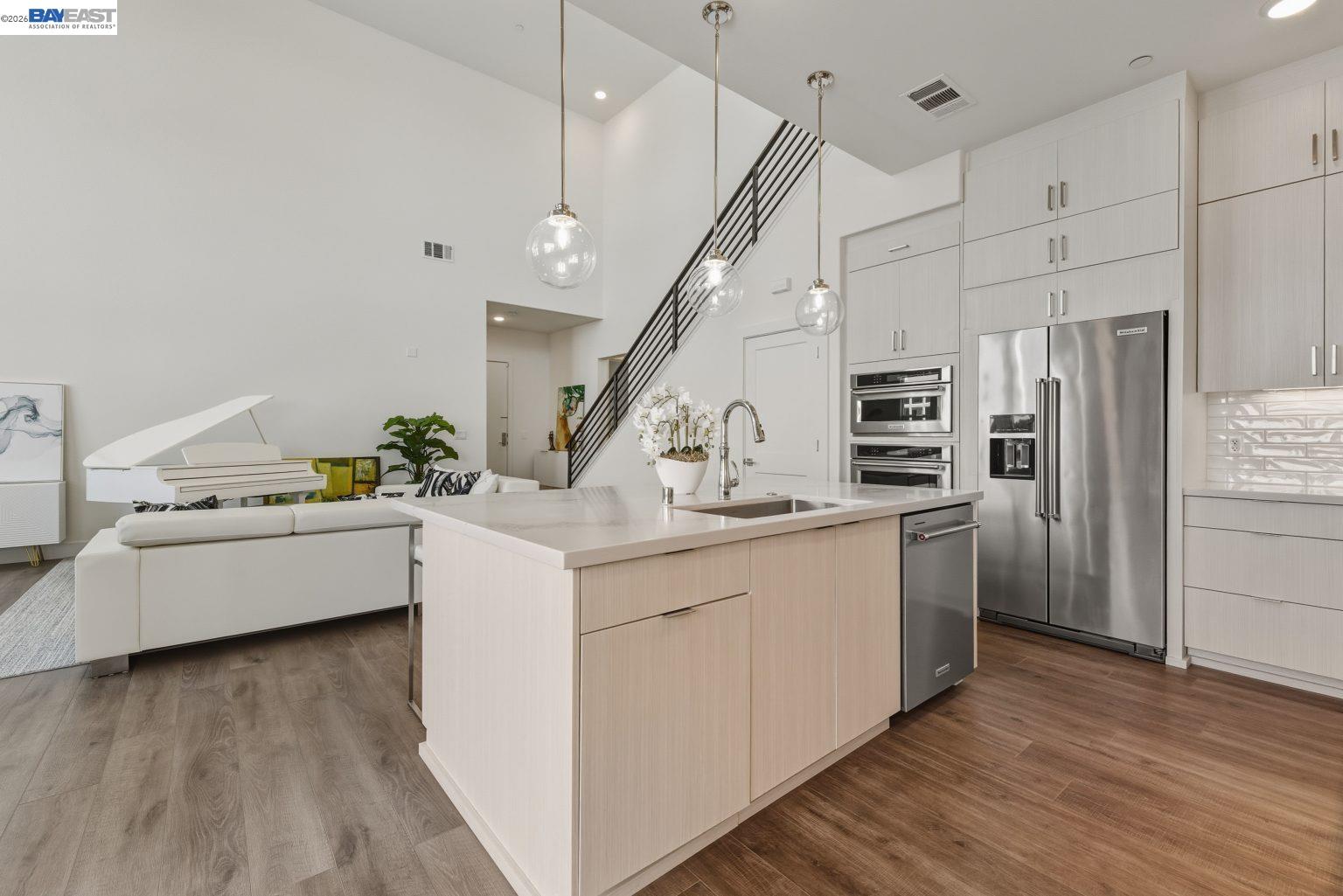 1748 Kilowatt Way, Unit 402 Fremont, CA 94539 - Photo 19 of 60 a kitchen with counter top space and stainless steel appliances