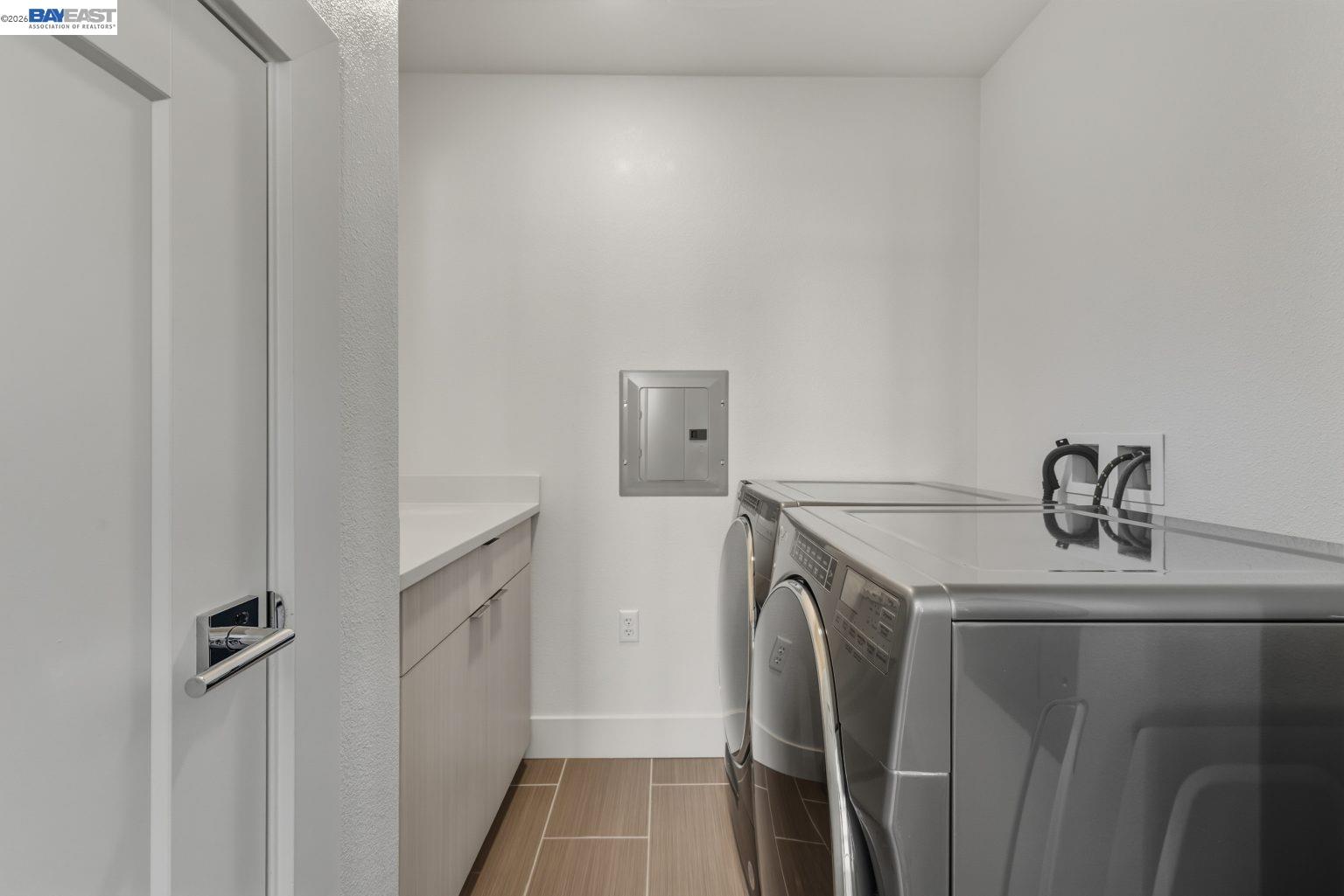 1748 Kilowatt Way, Unit 402 Fremont, CA 94539 - Photo 24 of 60 a utility room with dryer and washer