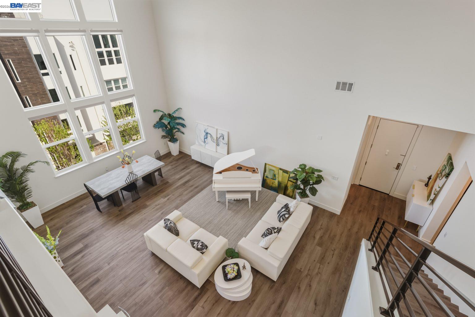 1748 Kilowatt Way, Unit 402 Fremont, CA 94539 - Photo 40 of 60 a living room with furniture and a window