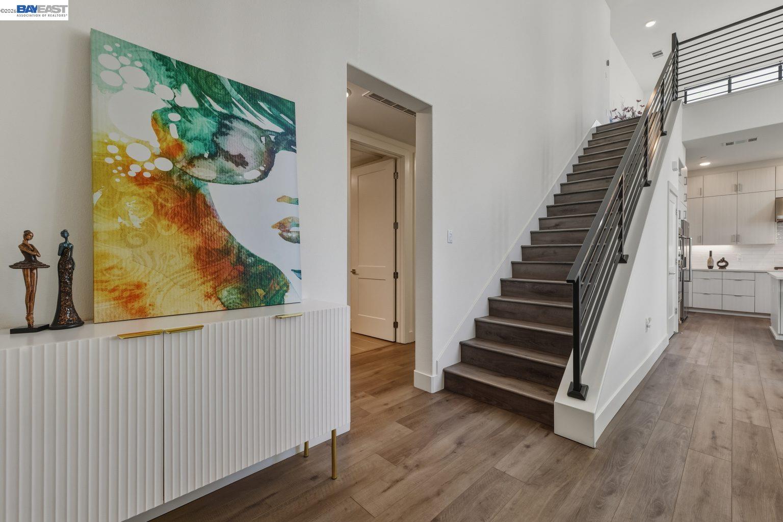 1748 Kilowatt Way, Unit 402 Fremont, CA 94539 - Photo 4 of 60 a view of a hallway with wooden floor and entryway