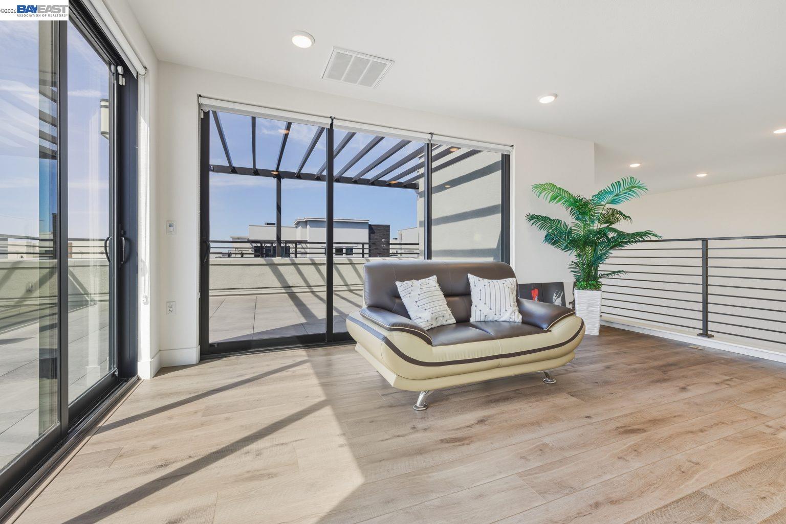1748 Kilowatt Way, Unit 402 Fremont, CA 94539 - Photo 42 of 60 a living room with furniture