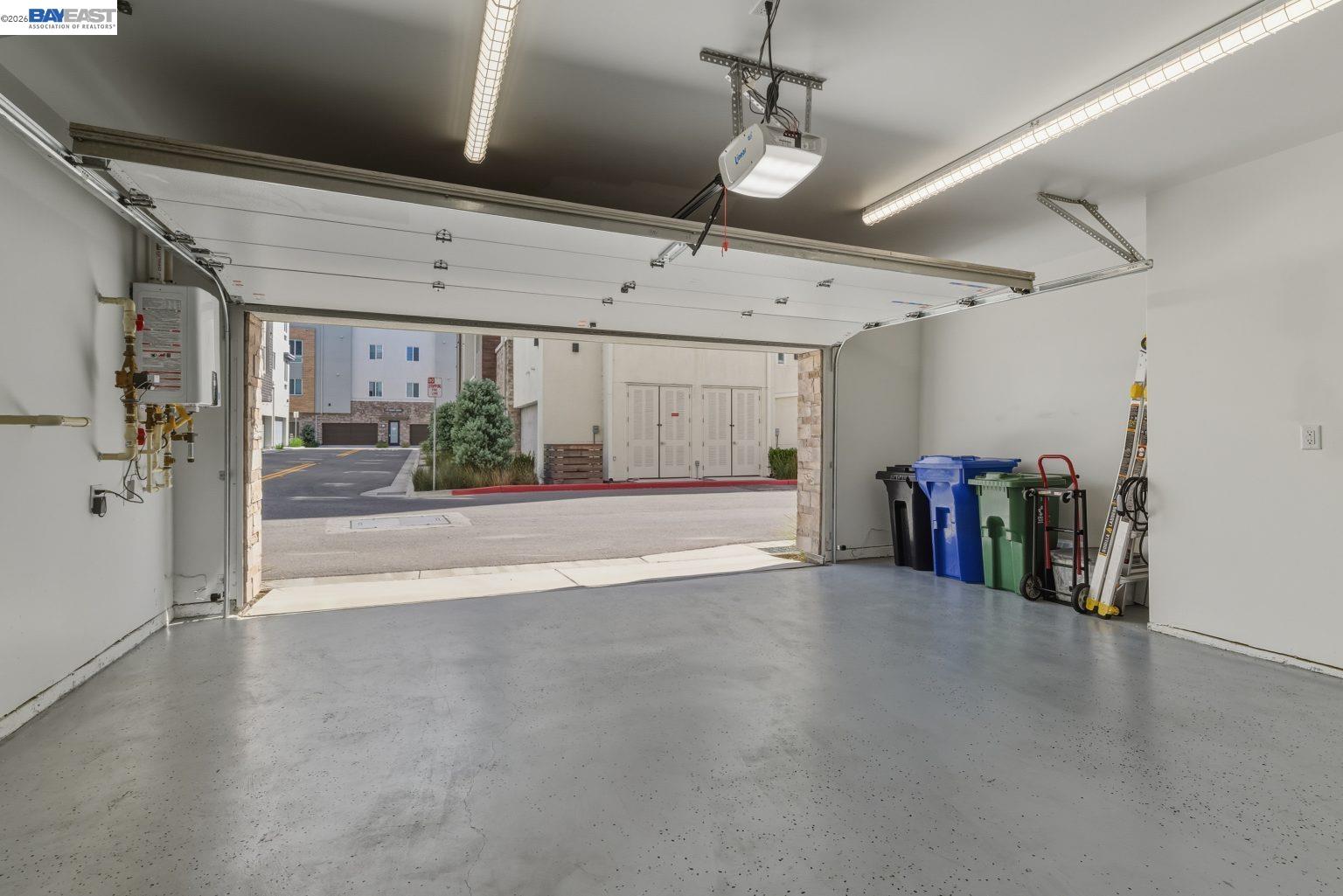 1748 Kilowatt Way, Unit 402 Fremont, CA 94539 - Photo 47 of 60 a view of a garage with furniture