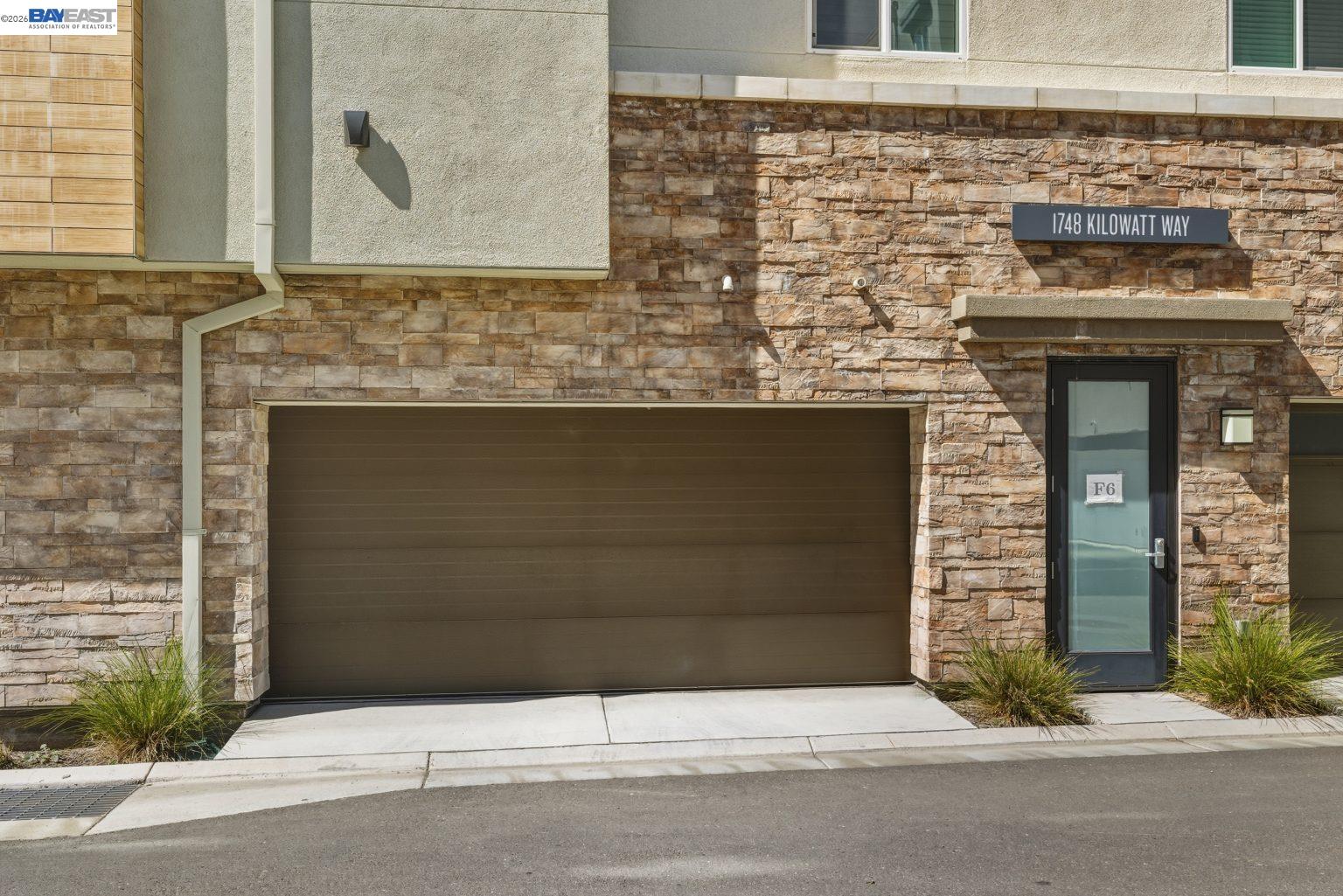 1748 Kilowatt Way, Unit 402 Fremont, CA 94539 - Photo 48 of 60 a front view of a house