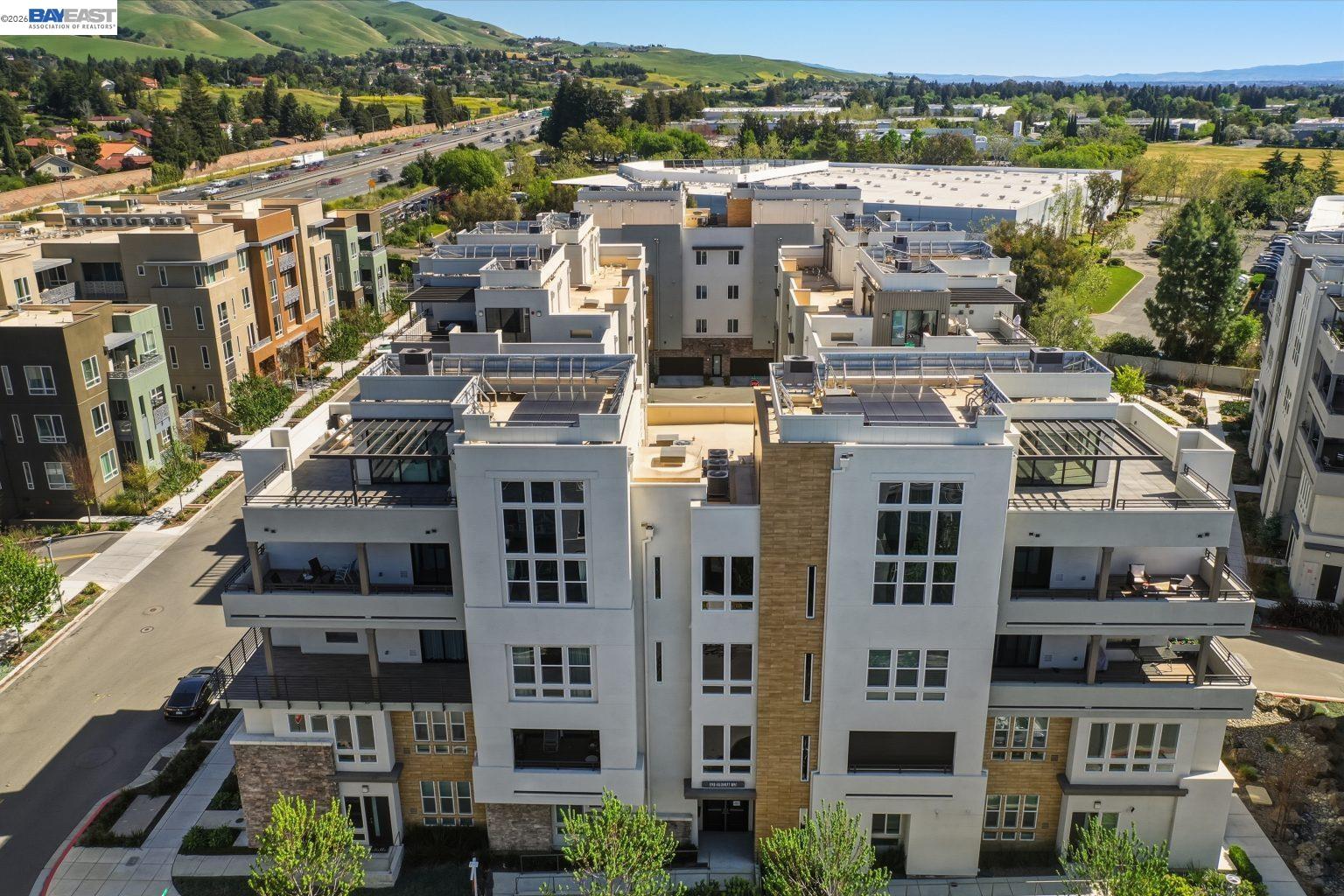 1748 Kilowatt Way, Unit 402 Fremont, CA 94539 - Photo 49 of 60 a view of a city that has tall buildings