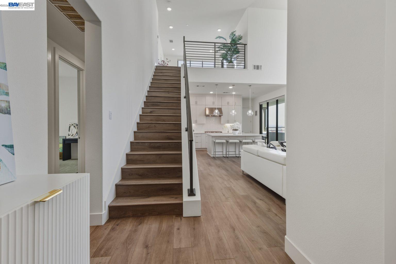 1748 Kilowatt Way, Unit 402 Fremont, CA 94539 - Photo 6 of 60 a view of entryway and hall with wooden floor