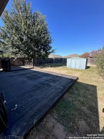 a view of a backyard of the house