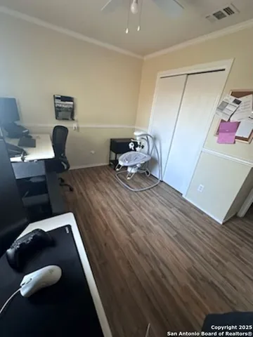 a view of workspace with wooden floor