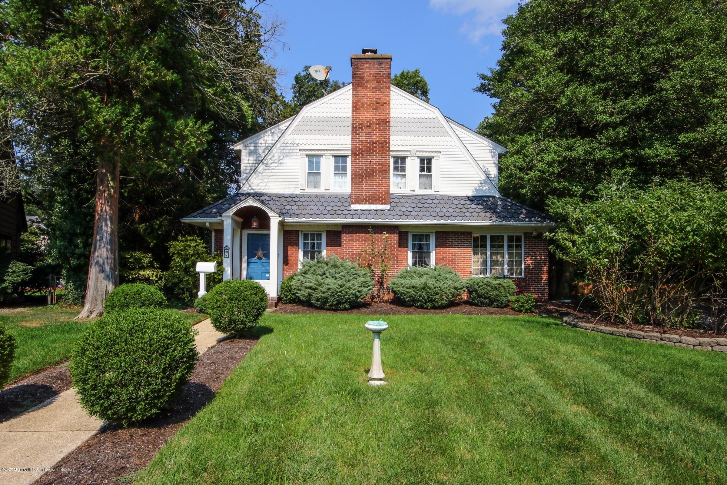 8 Garden Road Little Silver, NJ 07739 - Photo 1 of 1 a front view of a house with a yard
