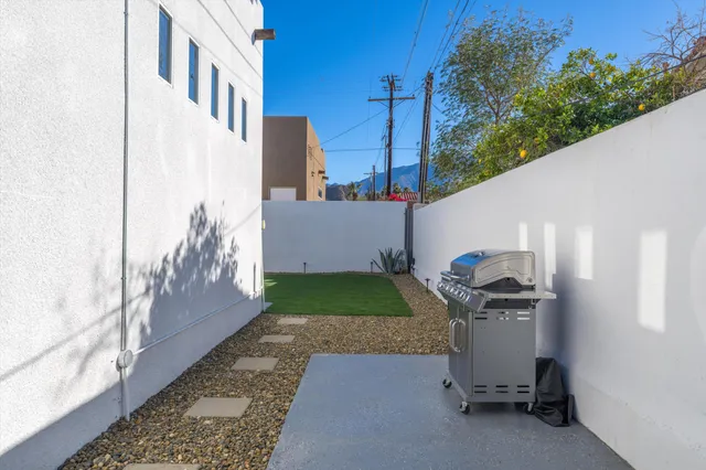 a view of a back yard of the house