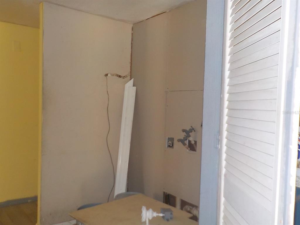 7445 Southwest 15th Place Ocala, FL 34474 - Photo 19 of 27 a bathroom with a granite countertop shower and a toilet