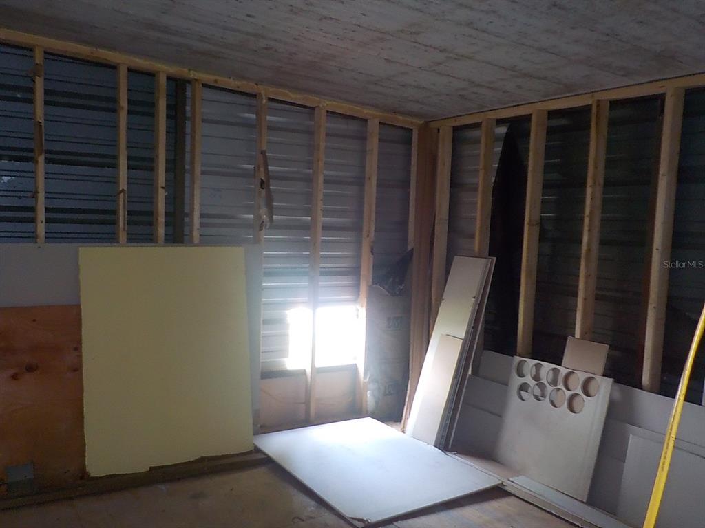 7445 Southwest 15th Place Ocala, FL 34474 - Photo 27 of 27 a view of an empty room with a window