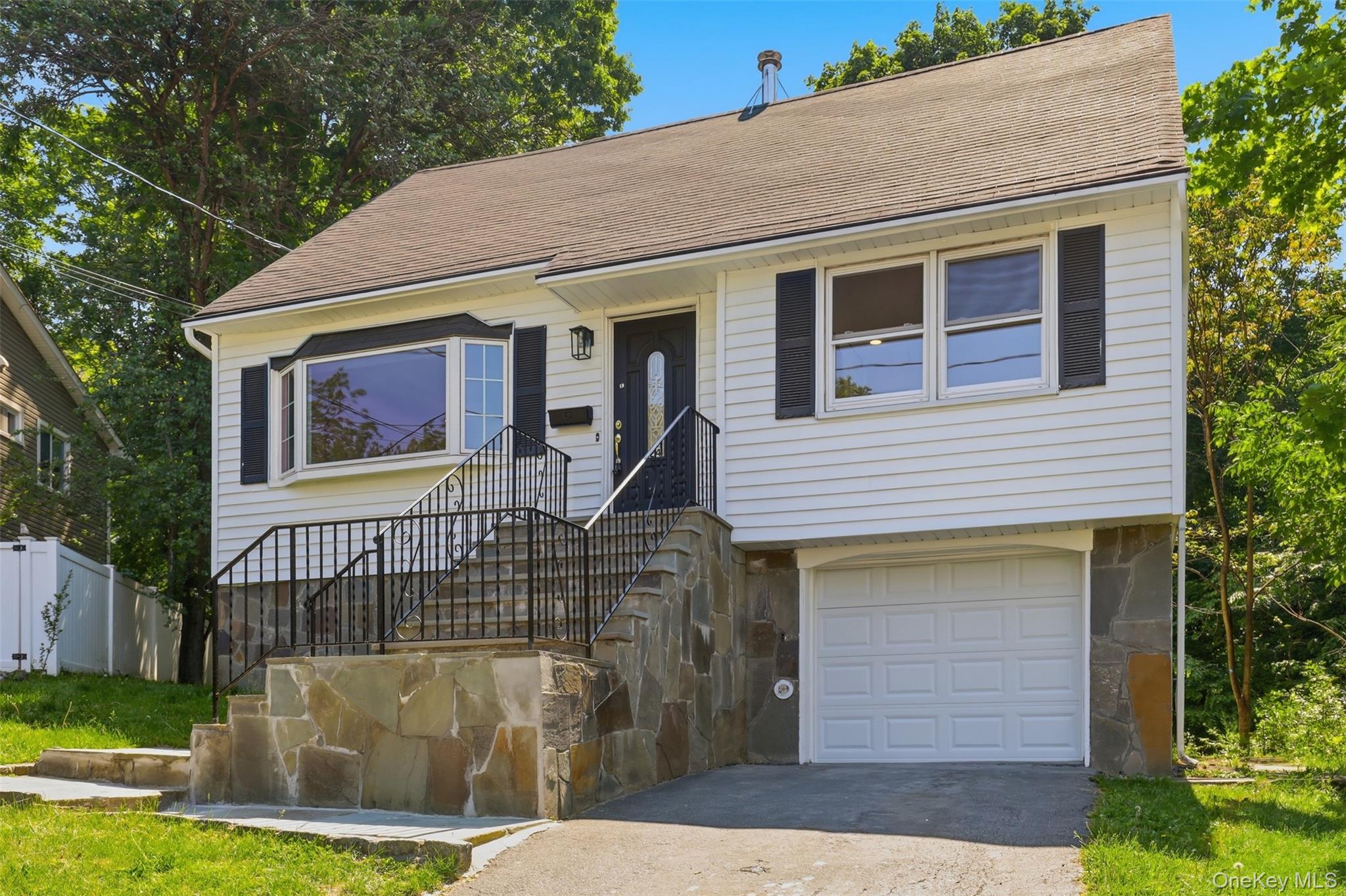 24 Fuller Road Ossining, NY 10562 - Photo 3 of 48 a front view of a house with garden
