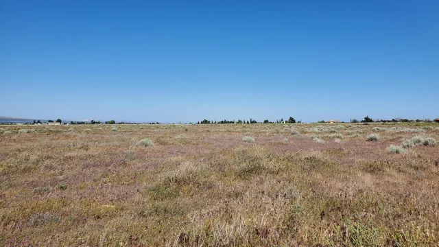 a view of an outdoor space and a mountain view