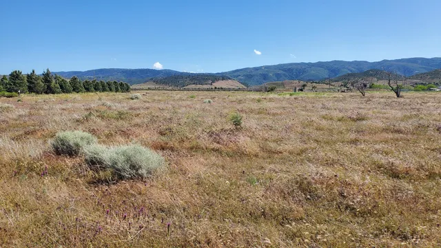 a view of an outdoor space and mountain view