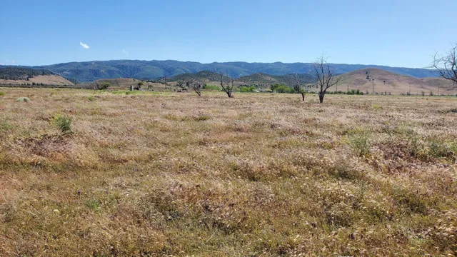 a view of ocean and mountain