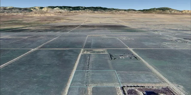 a view of a house with a mountain