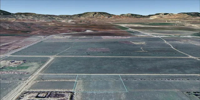 a view of swimming pool with a yard