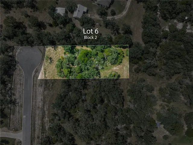 a view of a sign in a yard