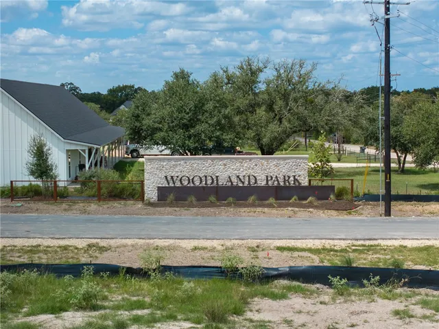 a view of swimming pool with a yard