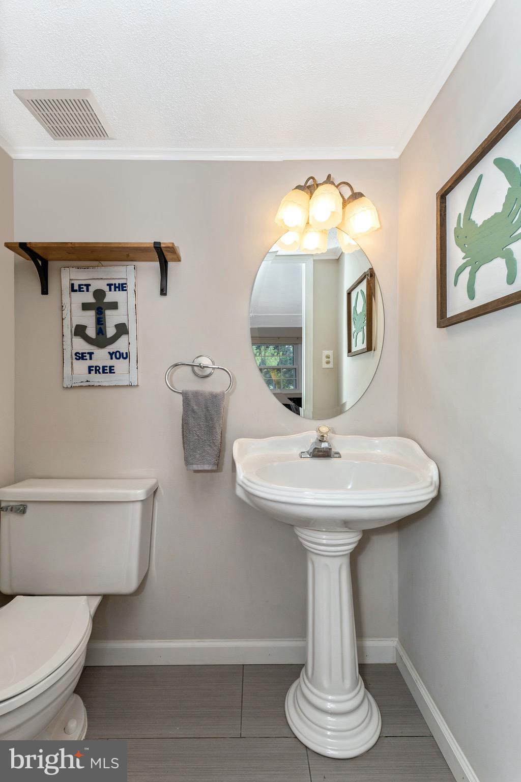 24008 Log House Road Gaithersburg, MD 20882 - Photo 33 of 58 Half bath off the family room