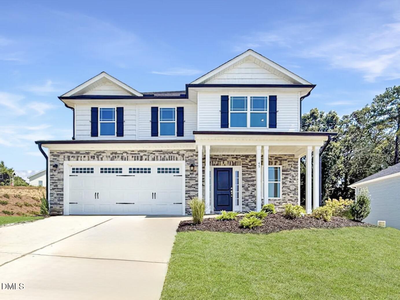 45 High Hampton Way Fuquay-Varina, NC 27526 - Photo 1 of 43 a view of house with yard and front view of a house