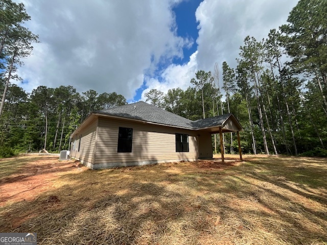 126 B&d Estates Road Milledgeville, GA 31061 - Photo 23 of 31 a front view of a house with a yard