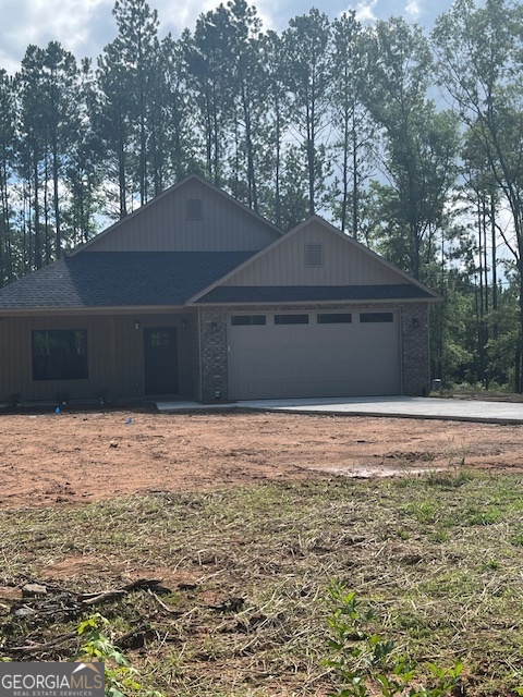 126 B&d Estates Road Milledgeville, GA 31061 - Photo 3 of 31 a front view of a house with a yard