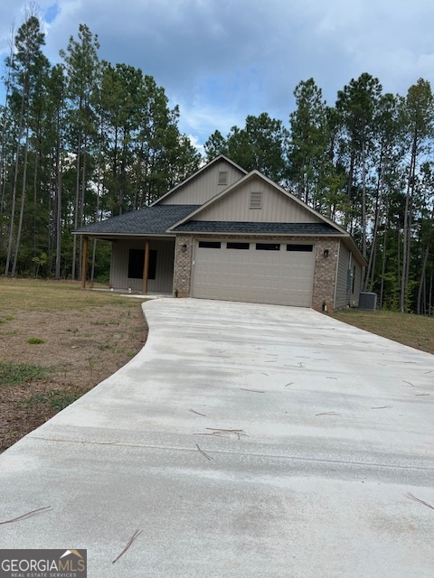 126 B&d Estates Road Milledgeville, GA 31061 - Photo 31 of 31 a house with trees in the background