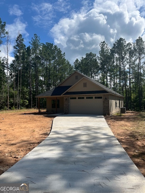 126 B&d Estates Road Milledgeville, GA 31061 - Photo 4 of 31 a house with trees in the background