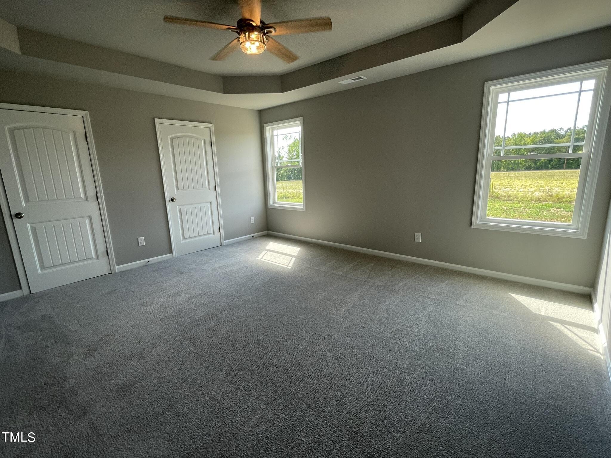86 Scotties Ridge Drive Princeton, NC 27569 - Photo 10 of 19 a view of an empty room with a window