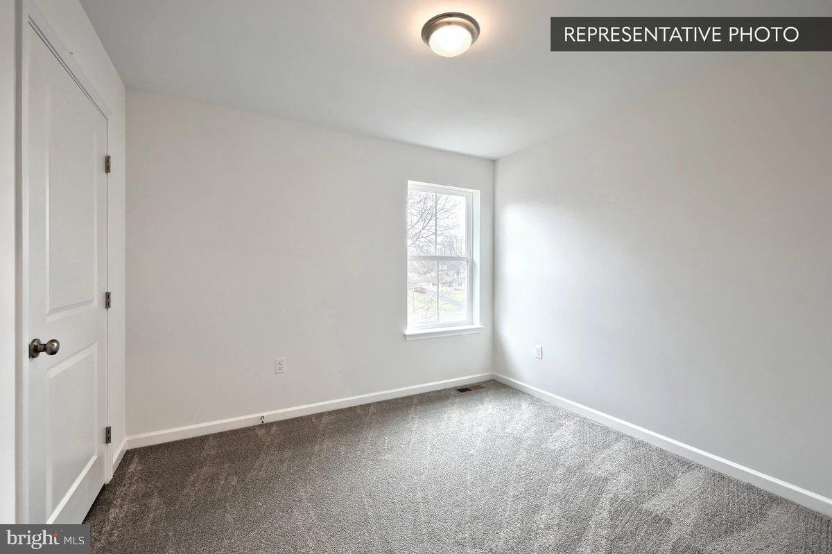 Pin Oak Plan At Hills Spring Grove, PA 17362 - Photo 31 of 38 an empty room with a window