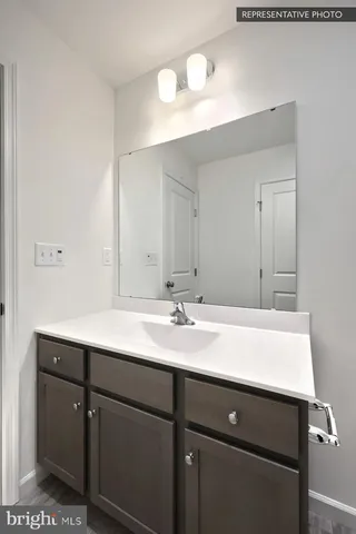 a bathroom with a shower and a bath tub