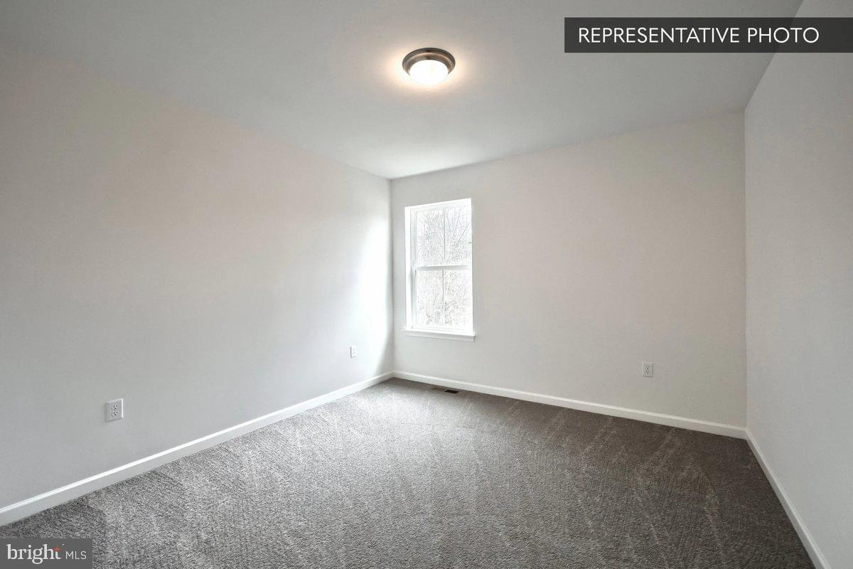Pin Oak Plan At Hills Spring Grove, PA 17362 - Photo 35 of 38 an empty room with a window